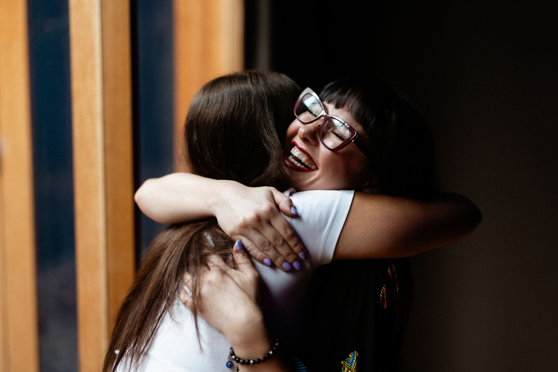 Kasia hugging a client after her appointment